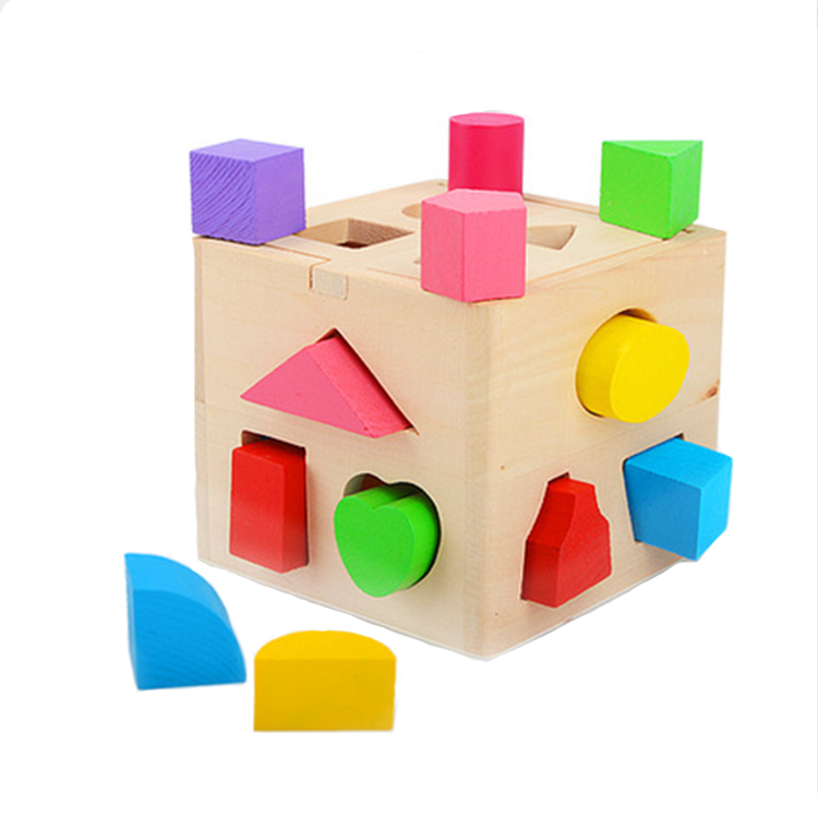 Shape sorting cube - A classic wooden toy with 12 shapes