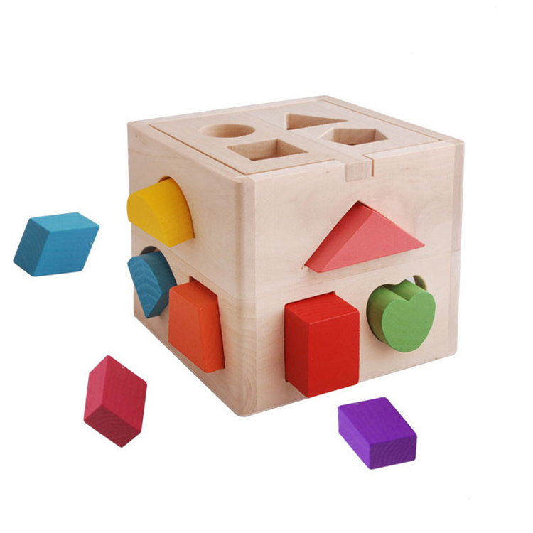 Shape sorting cube - A classic wooden toy with 12 shapes