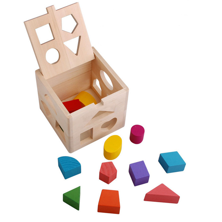 Shape sorting cube - A classic wooden toy with 12 shapes