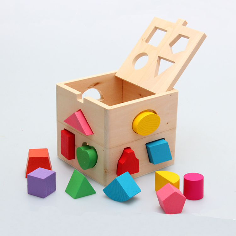 Shape sorting cube - A classic wooden toy with 12 shapes